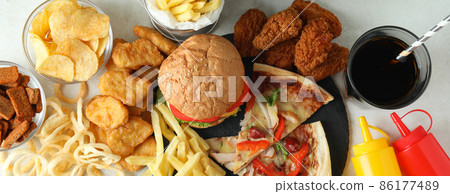 Concept of fast food on white textured table 86177489