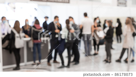 Abstract blured people at exhibition hall of expo event trade show. Business convention show or job fair. Business concept background. Abstract blured people at exhibition hall of expo event trade show. Business convention show or job fair. Business concept background. 86178073