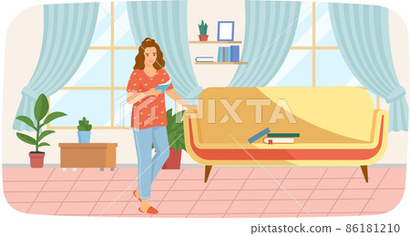 Young woman reading book standing near stack of books in living room, studying at home Young woman reading book standing near stack of books in living room, studying at home 86181210
