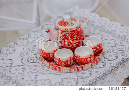Tea set used in a Chinese wedding tea ceremony. Tea set used in a Chinese wedding tea ceremony. 86181457