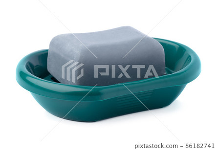 Soap on a plastic soap dish isolated on a white background Soap on a plastic soap dish isolated on a white background 86182741