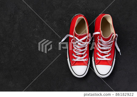 Template with summer footwear on black background 86182922