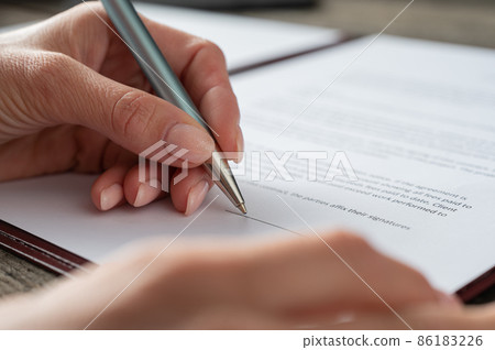 Signing a contract or document 86183226