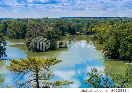 Lednice-Valtice complex, view from Minaret-observation tower for castle pond and park with trees. Lednice-Valtice complex, view from Minaret-observation tower for castle pond and park with trees. 86183514