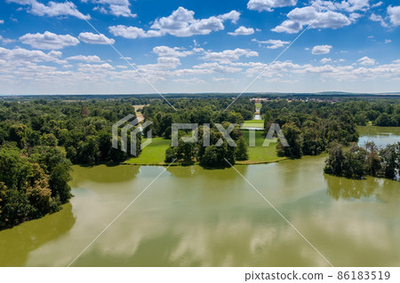Lednice-Valtice complex, view from Minaret-observation tower for castle pond , park with trees and castle Lednice 86183519