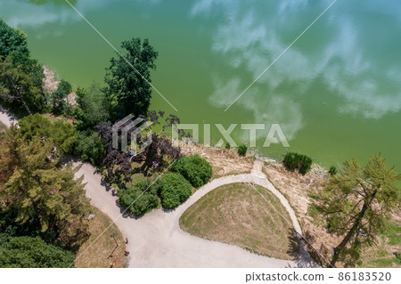Lednice-Valtice complex, view from Minaret-observation tower for path, castle pond and trees. 86183520