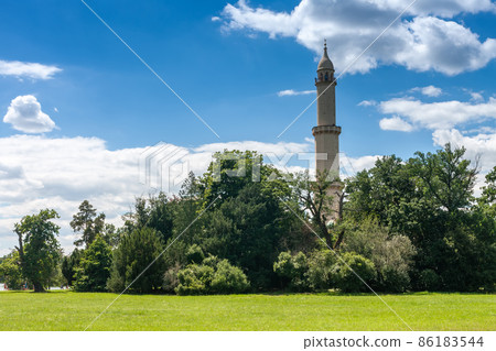 Minaret-observation tower in Moorish revival architecture style in Lednice-Valtice complex under reconstruction. 86183544