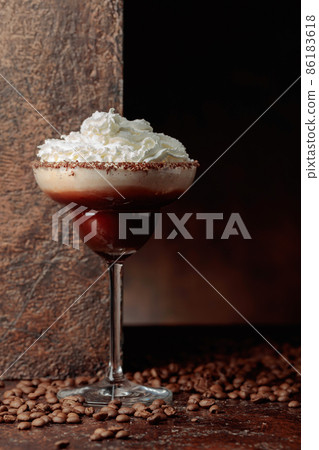 Coffee and chocolate cocktail with whipped cream. 86183618