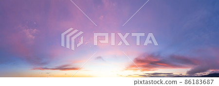 Panoramic View of Cloudscape during a colorful sunset or sunrise. Panoramic View of Cloudscape during a colorful sunset or sunrise. 86183687
