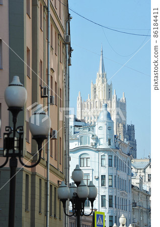 view of the high-rise of the Ministry of Foreign Affairs from the Old Arbat in Moscow 86184411