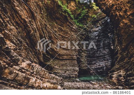 Peshtura Waterfall in Nivica Canyon in Albania 86186401