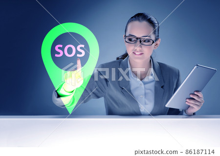 Businesswoman pressing SOS button in case of danger Businesswoman pressing SOS button in case of danger 86187114