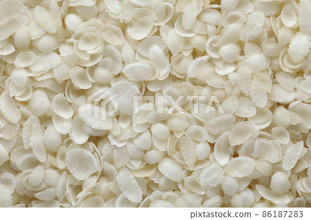 Cereal rice flakes. top view background closeup 86187283