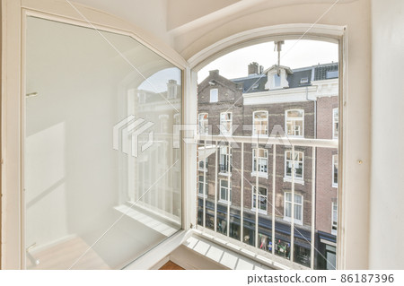 street view from a large white window 86187396