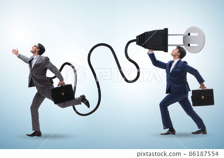 Businessman being powered by electric power Businessman being powered by electric power 86187554