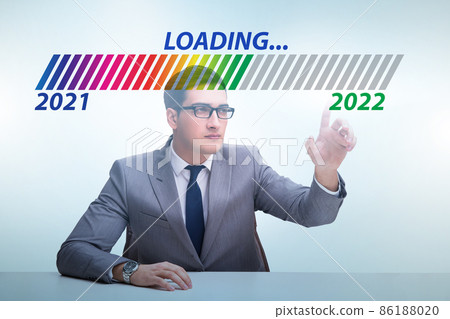 Businessman pressing virtual button with year 2022 86188020