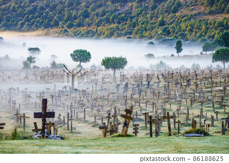 Haze in morning over Sad Hill Cemetery in Burgos, Spain 86188625