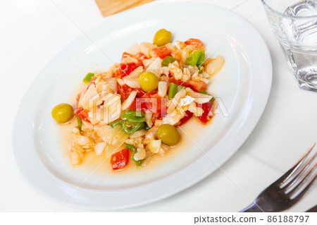 Seafood salad from slices of cod and vegetables Seafood salad from slices of cod and vegetables 86188797