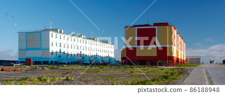 Summer view of the street and colorful buildings of the northern village of Tavayvaam, located in the Russian Far East 86188948