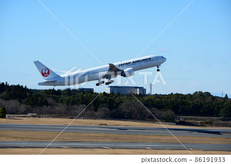 Japanese aircraft taking off from Narita Airport 86191933
