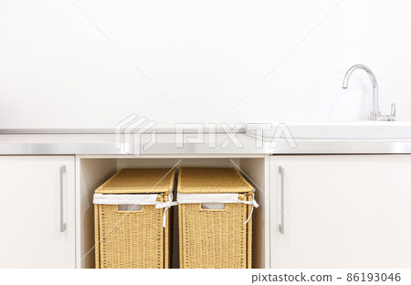 Laundry room in white modern style with baskets Laundry room in white modern style with baskets 86193046