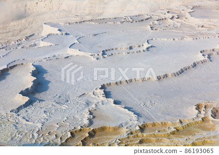 White travertine formations at hot springs of Pamukkale, Turkey White travertine formations at hot springs of Pamukkale, Turkey 86193065