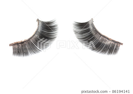 Use of artificial eyelashes macro Isolated Use of artificial eyelashes macro Isolated 86194141