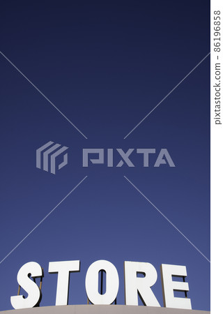Blue sky and supermarket sign Blue sky and supermarket sign 86196858