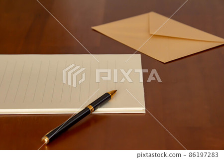 Image of writing letters on stationery and envelopes Image of writing letters on stationery and envelopes 86197283