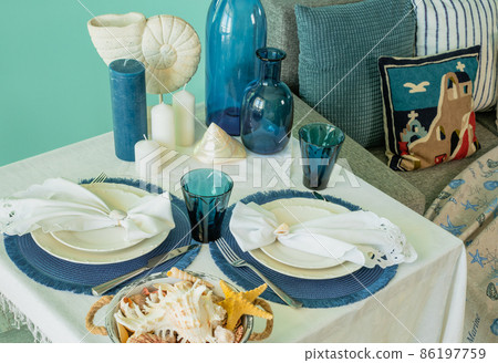Marine style in the interior, table setting in a sea style 86197759