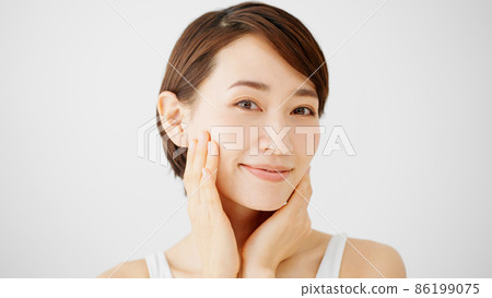 Beauty image Young woman doing skin care Beauty image Young woman doing skin care 86199075
