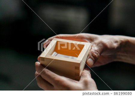 Sake brewing senior man at hand 86199080