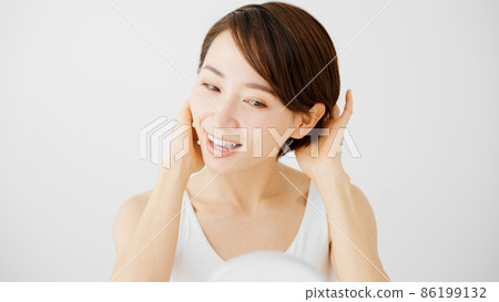 Young women doing hair care Young women doing hair care 86199132