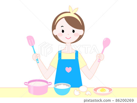 A woman cooking in the kitchen A woman cooking in the kitchen 86200269