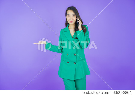Portrait beautiful young asian woman smile with smart mobile phone Portrait beautiful young asian woman smile with smart mobile phone 86200864