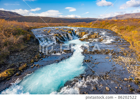 Blue Bruarfoss waterfalls in Iceland 86202522