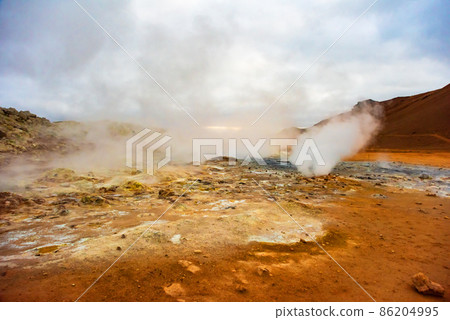 Fumarole field in Namafjall geothermal zone Iceland. Famous tourist attraction 86204995