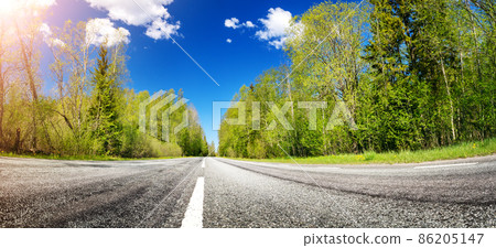 Close-up view of the asphalt road panorama in countryside on sunny day in summer. 86205147