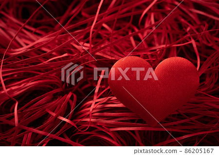 Red paper cushion and heart symbol Red paper cushion and heart symbol 86205167