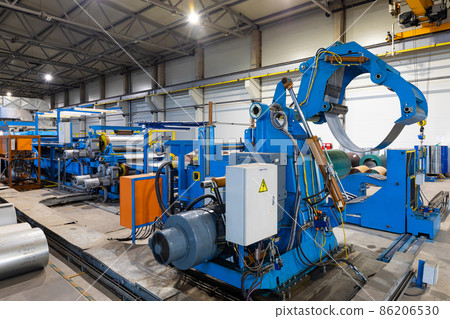 Photo shot of rolls of steel sheet stored in warehouse; Cold rolled steel coils at the factory 86206530