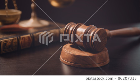 Judge's gavel and scale. Law and justice system 86207313