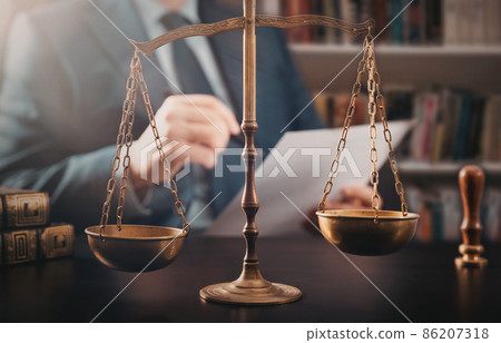 Lawyer working in the office. Law and justice. 86207318