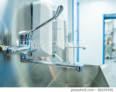 Hospital surgery washing station for disinfection of doctors before surgery. Hospital surgery washing station for disinfection of doctors before surgery. 86209486