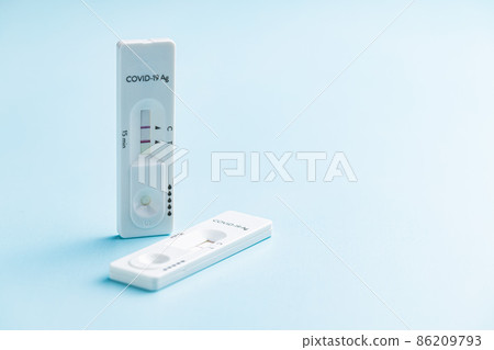 Positive Covid-19 antigen test. Coronavirus antigen rapid test. 86209793