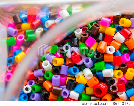 Texture of multicolor beads, colorful background Texture of multicolor beads, colorful background 86210122