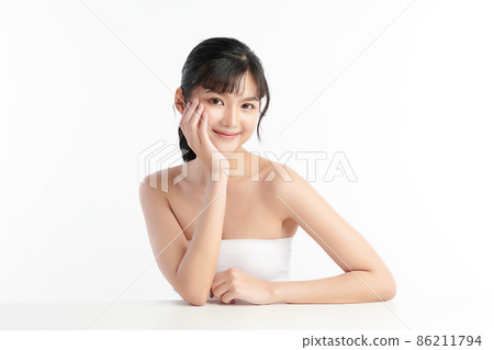 Beautiful young asian woman with clean fresh skin on white background, Face care, Facial treatment, Beautiful young asian woman with clean fresh skin on white background, Face care, Facial treatment, 86211794