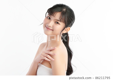 Beautiful young asian woman with clean fresh skin on white background, Face care, Facial treatment, 86211795