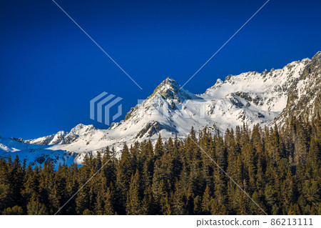 View of the landscape with snowy mountains. 86213111