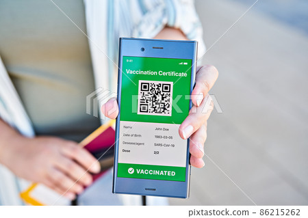 Woman received message on app mobile about negative COVID-19 express test results at airport. Ready for summer vacation concept Woman received message on app mobile about negative COVID-19 express test results at airport. Ready for summer vacation concept 86215262