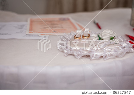 Wedding rings on a stand. wedding ceremony 86217847